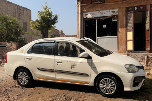 White sedan car for rental