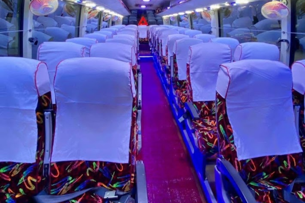 Luxury AC bus interior available for bus rental in Jodhpur