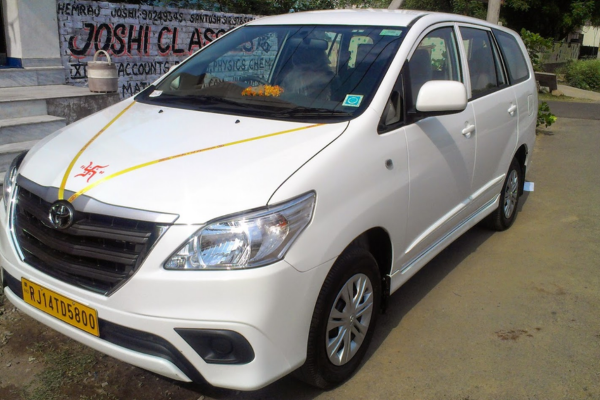 White Toyota Innova for Car Hire in Jaipur