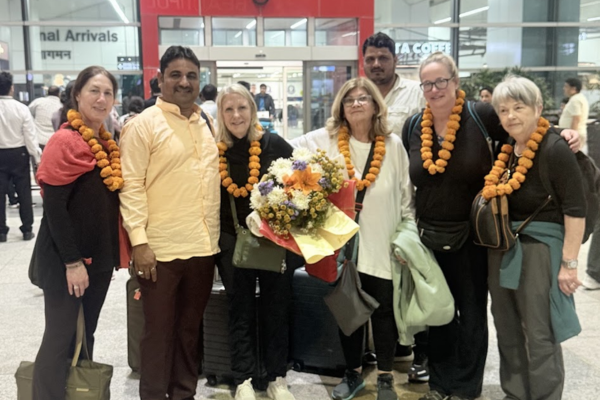 Airport pickup service in Udaipur with happy travelers