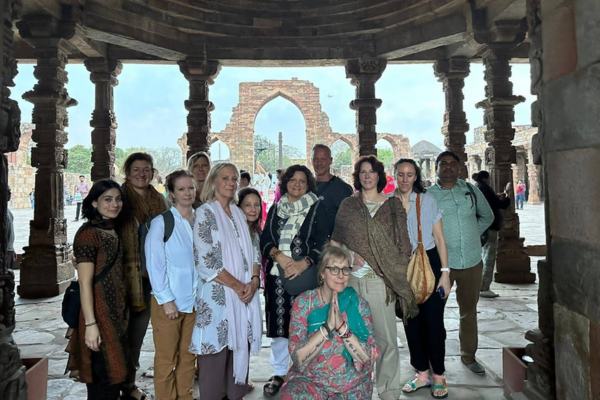 Group of tourists visiting Delhi with private car hire service