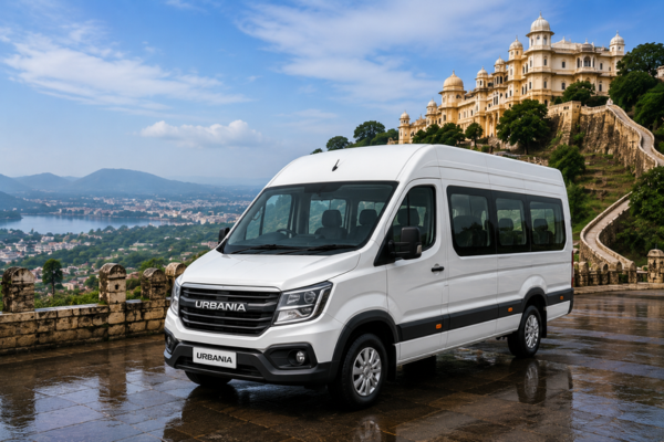 White luxury urbania tempo traveller with scenic mountain and lake view