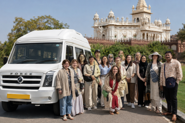 Tourist group standing near tempo traveller in Jodhpur