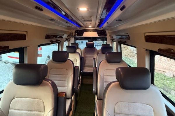 Luxury Tempo Traveller interior with comfortable seating