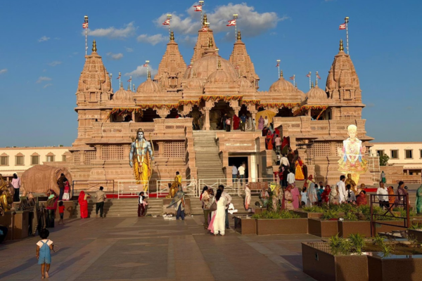 Tourists visiting the magnificent Akshardham Temple showcasing intricate Indian architecture