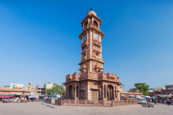 Historic Ghanta Ghar Clock Tower rising above the bustling Sardar Market in Jodhpur