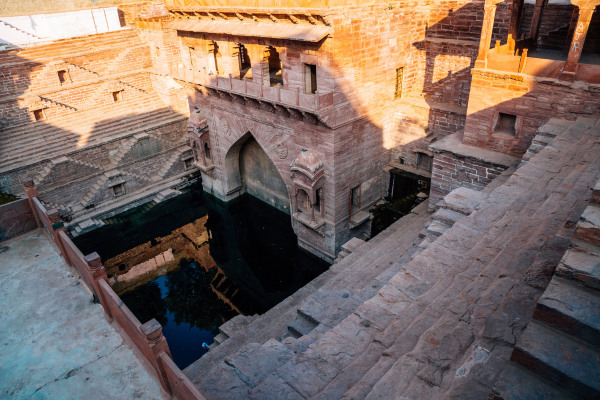 Historic Toorji Ka Jhalra stepwell featuring intricate stone architecture in Jodhpur